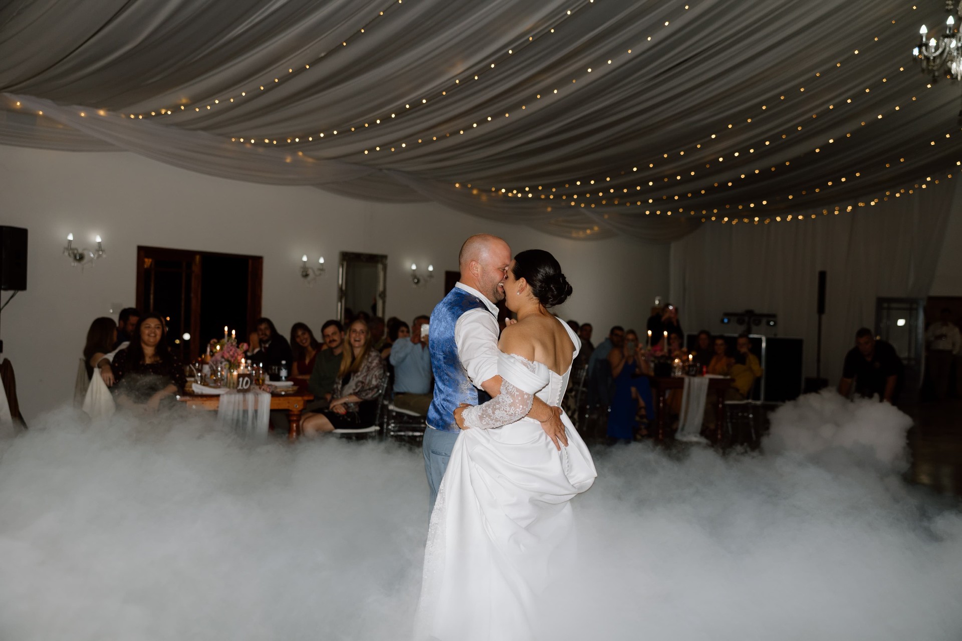 Couple dancing on a low-lying cloud of dry ice fog at an Eastern Cape wedding