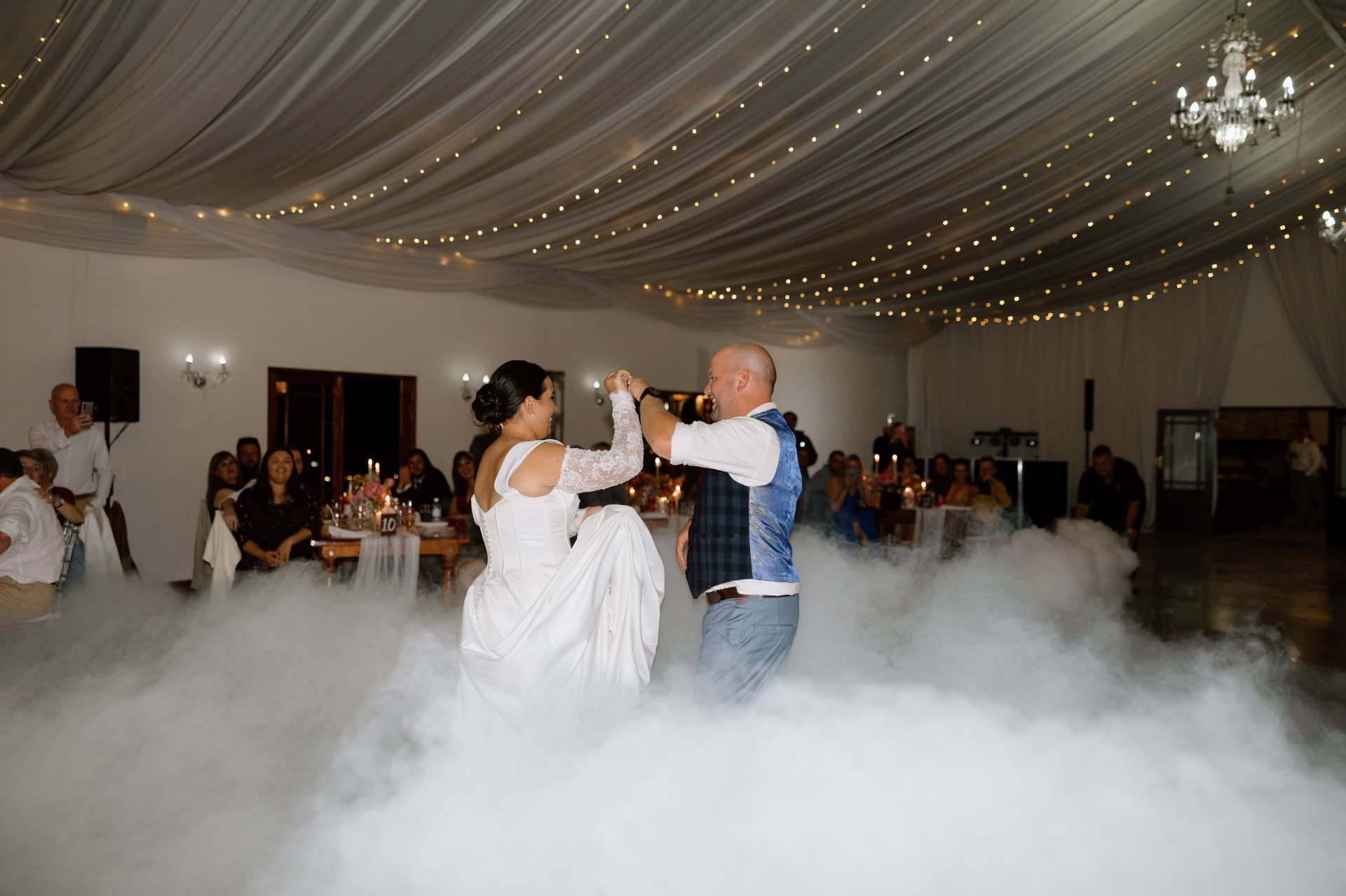 Bride twirling in a low dry ice cloud during a first dance at an Eastern Cape wedding